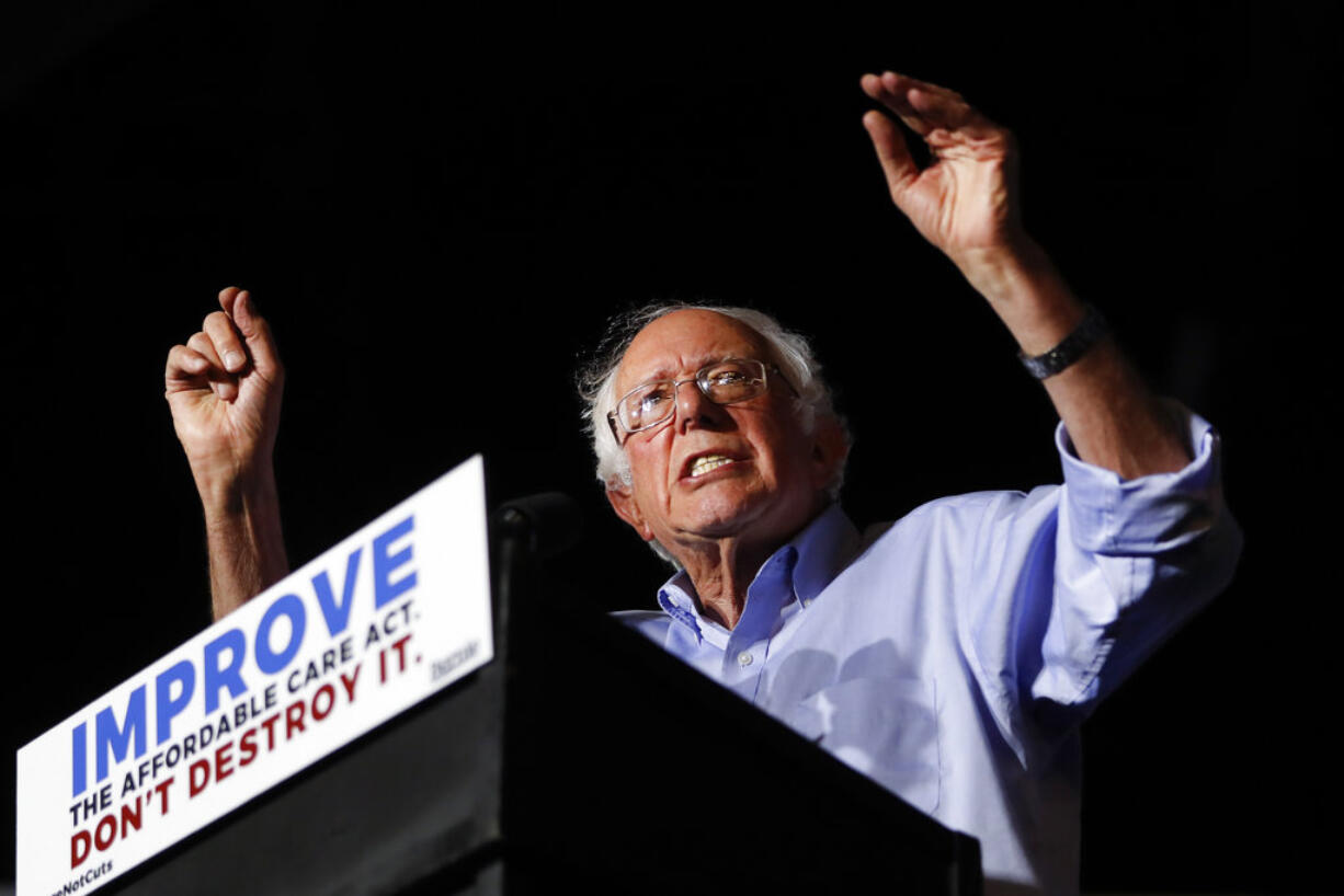 In this July 9, 2017 photo, Sen. Bernie Sanders, I-Vt., speaks during a "Care Not Cuts" rally in support of the Affordable Care Act in Covington, Ky.  House Minority Leader Nancy Pelosi is declining to endorse Sen.