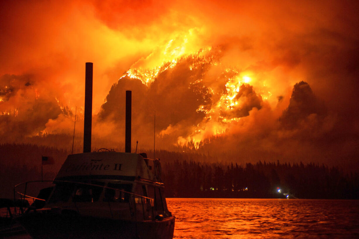 This photo provided by KATU-TV shows the Eagle Creek wildfire as seen from Stevenson, across the Columbia River, burning in the Columbia River Gorge above Cascade Locks, Ore., on Sept. 4, 2017.