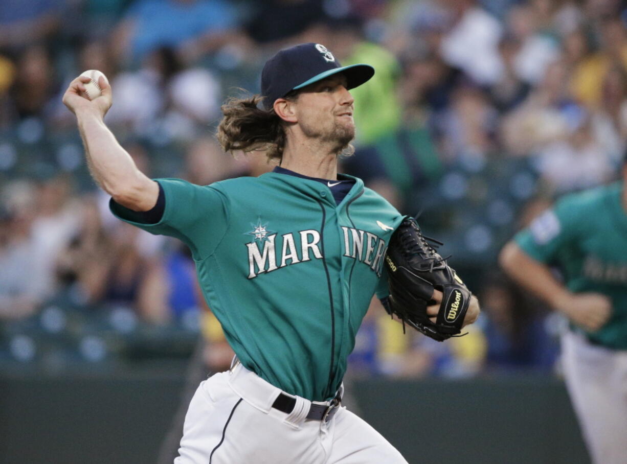 Seattle Mariners starting pitcher Mike Leake throws to the Oakland Athletics during the first inning of a baseball game, Friday, Sept. 1, 2017, in Seattle. (AP Photo/Ted S.