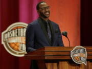 Tracy McGrady speaks during his enshrinement into the Naismith Memorial Basketball Hall of Fame, Friday, Sept. 8, 2017, in Springfield, Mass. McGrady is a seven-time NBA All-Star and a two-time NBA scoring champion who played for seven NBA teams in his 16-season pro career.