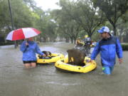 Residents and pets are evacuated from their homes as floodwaters from Tropical Storm Harvey rise in Houston. Animal Planet is airing a special Saturday night called “Surviving Harvey: Animals After the Storm.” The program airs Saturday at 8 p.m. on the East and West coasts. (Godofredo A.