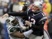 New York Jets defensive end Sheldon Richardson, left, is joining the Seattle Seahawks after being traded for wide receiver Jermaine Kearse and a second-round draft pick.