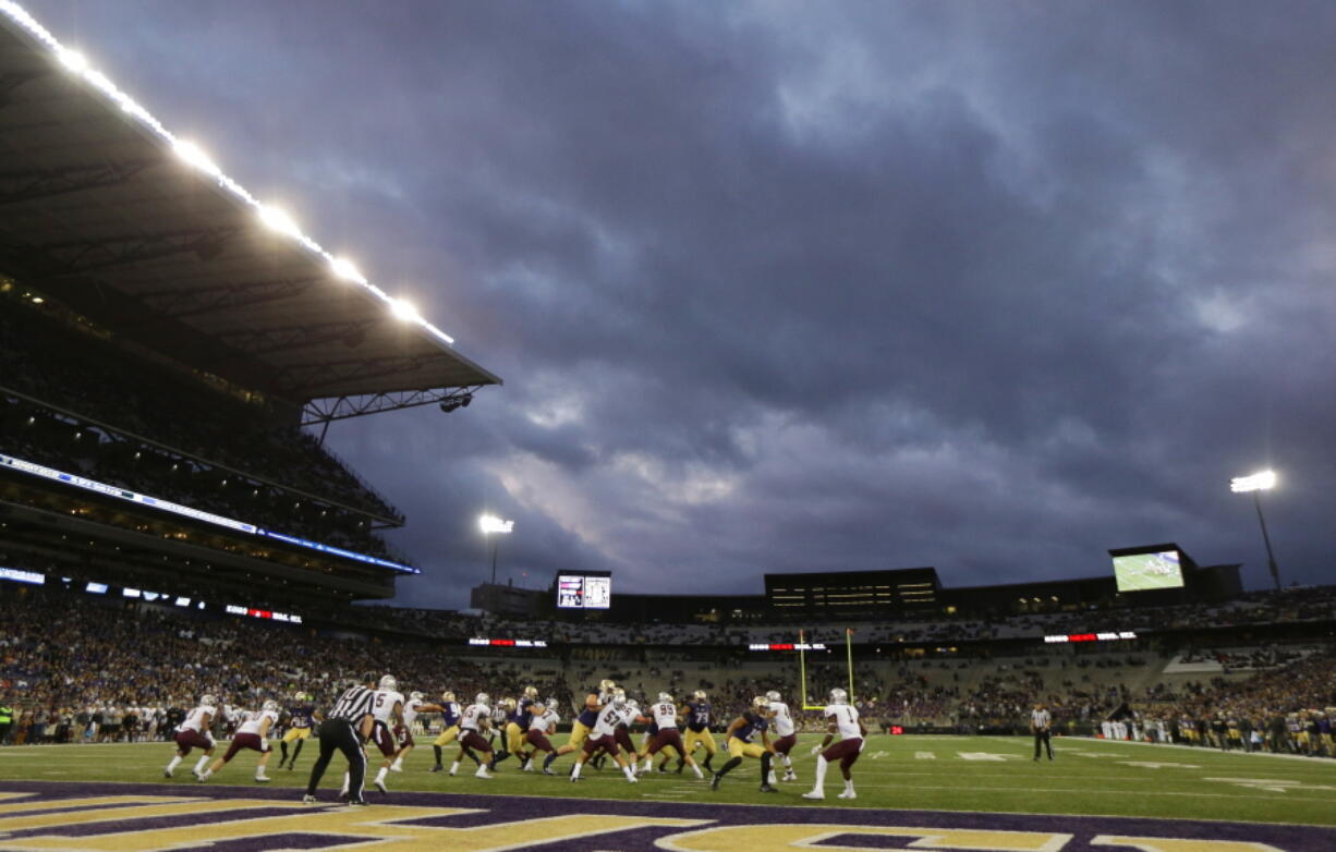 Washington and Montana play under a cloudy sky at Husky Stadium on Saturday, Sept. 9, 2017, in Seattle. Washington won 63-7. (AP Photo/Ted S.