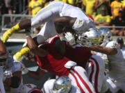 Oregon running back Royce Freeman leaps into the end zone for a second quarter score against Nebraska in an NCAA college football game Saturday, Sept. 9, 2017, in Eugene, Ore.