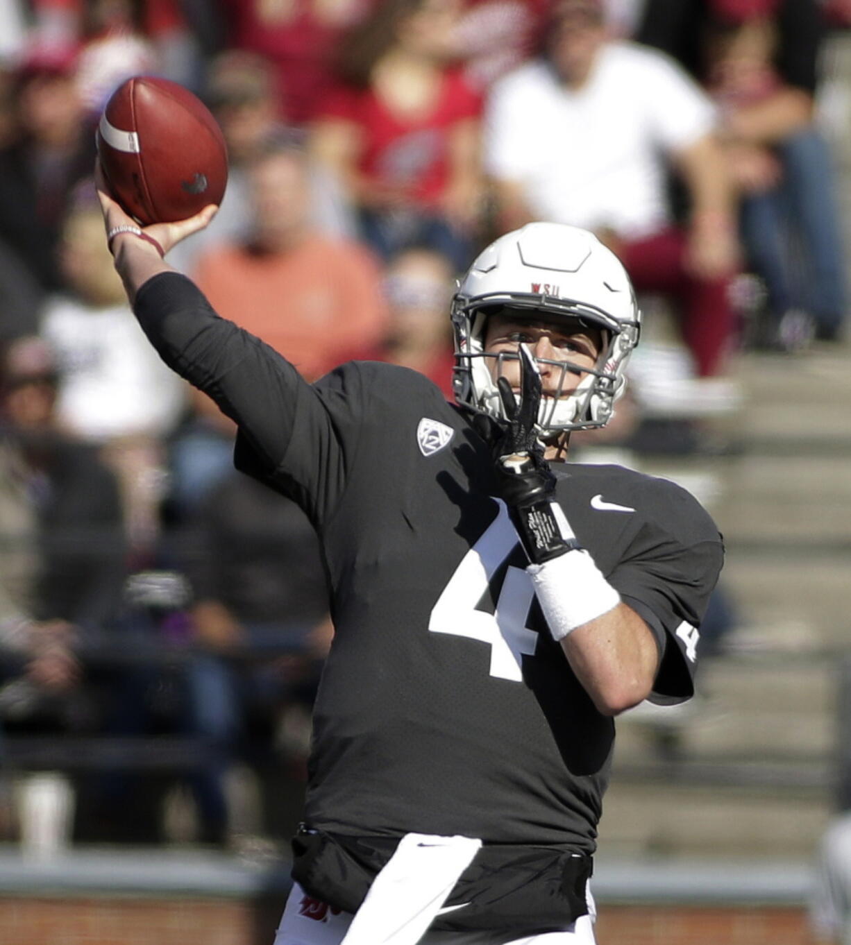 Washington State quarterback Luke Falk (4) throws a pass during the first half of an NCAA college football game against Nevada in Pullman, Wash., Saturday, Sept. 23, 2017.