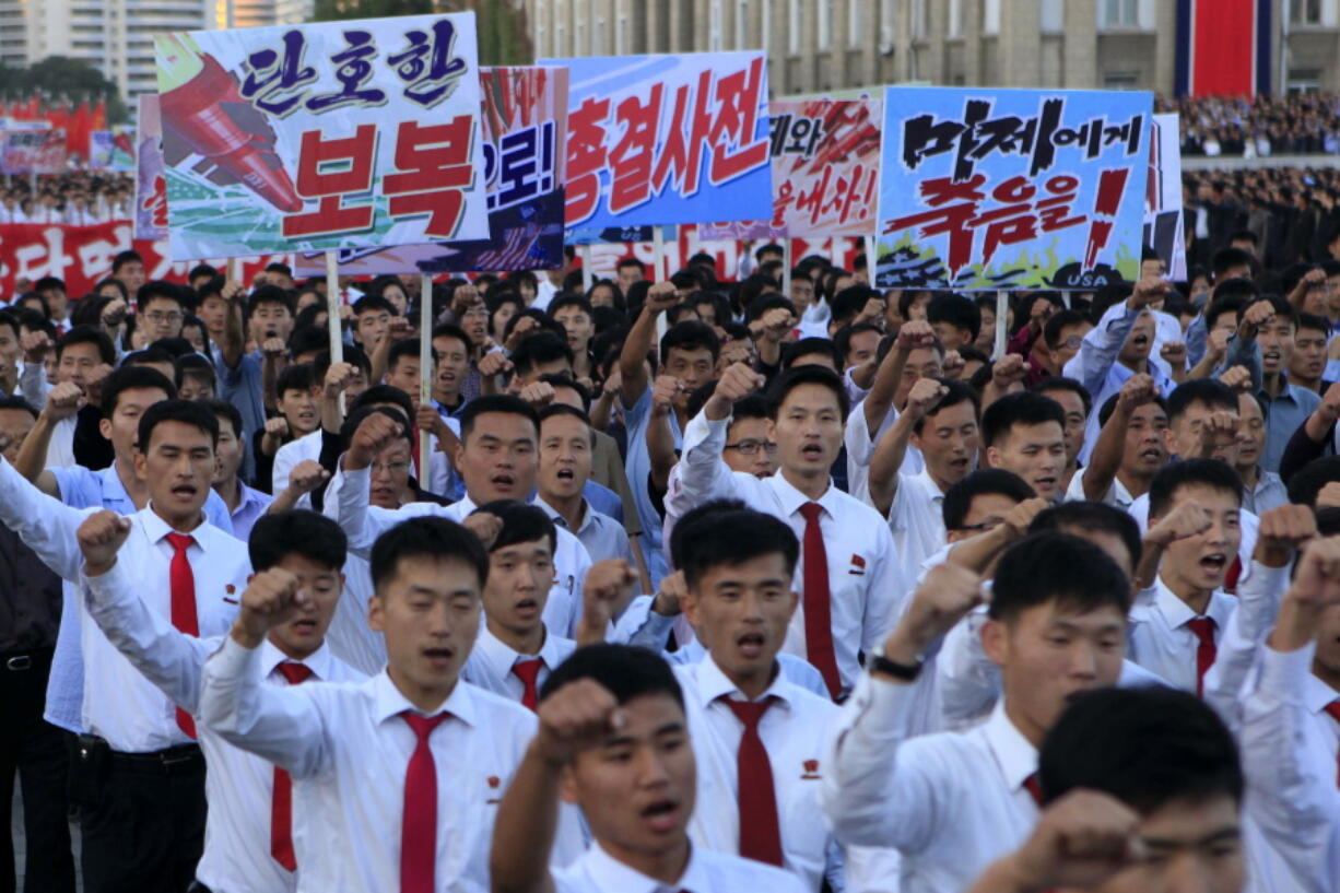 North Koreans gather at Kim Il Sung Square to attend a mass rally against America on Saturday in Pyongyang, North Korea, a day after the country’s leader issued a rare statement attacking Donald Trump.