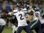 Seattle Seahawks quarterback Trevone Boykin (2) passes against the Oakland Raiders during the first half of an NFL preseason football game in Oakland, Calif., Thursday, Aug. 31, 2017.