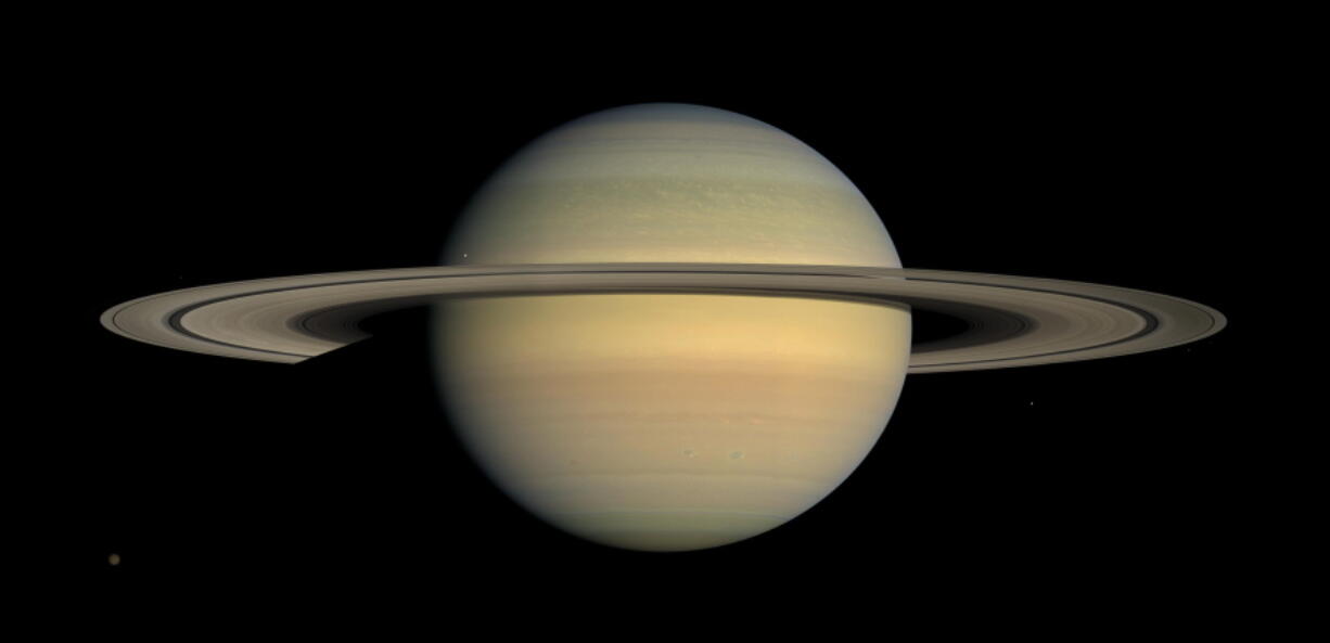 This July 23, 2008 image made available by NASA shows the planet Saturn, as seen from the Cassini spacecraft. After a 20-year voyage, Cassini is poised to dive into Saturn on Friday, Sept. 15, 2016.