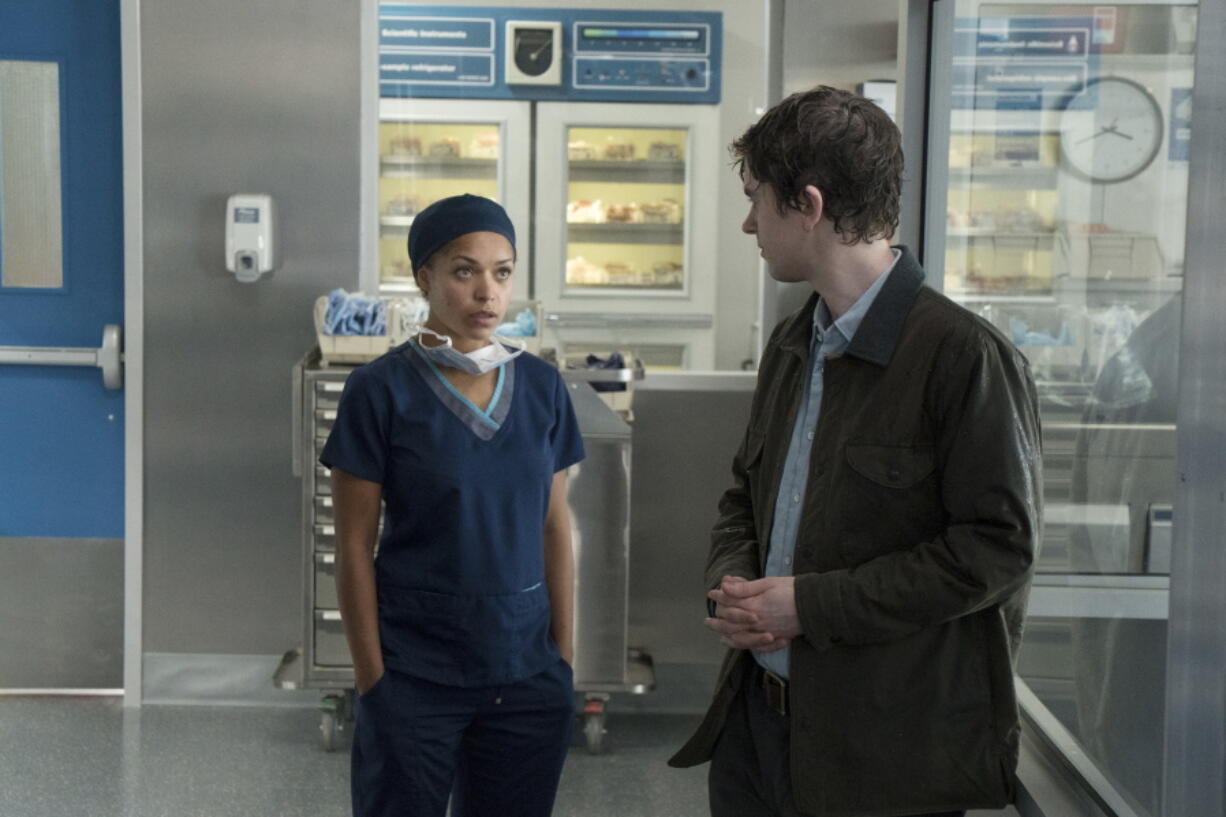 This image released by ABC shows Antonia Thomas, left, and Freddie Highmore in a scene from “The Good Doctor,” premiering Sept. 25, on ABC.