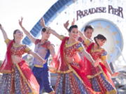 Performers take part in a Diwali celebration Nov. 13 at Disney California Adventure Park in Anaheim, Calif. Diwali is a festival of lights celebrated by Hindus, Sikhs and Jains in India and other countries, but the holiday is spreading.