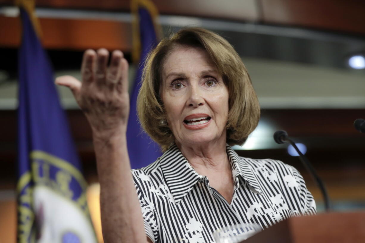 In this July 27, 2017 file photo, House Minority Leader Nancy Pelosi of Calif. gestures during a news conference on Capitol Hill in Washington. At the urging Pelosi, President Donald Trump is trying to reassure the immigrants in a program that his administration announced it is ending. (AP Photo/J.