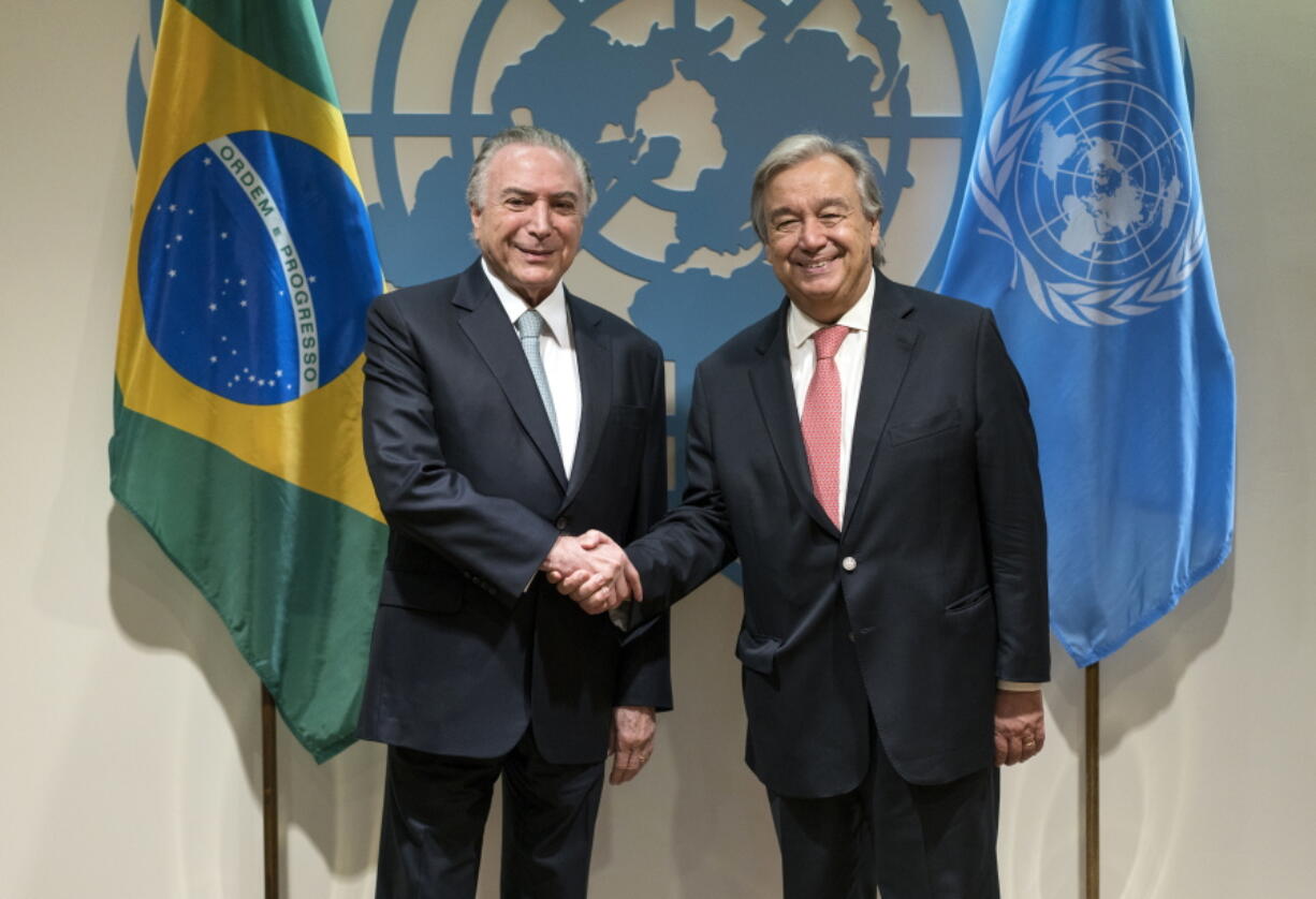 Brazilian President Michel Temer, left, is greeted by United Nations Secretary-General Antonio Guterres before a meeting Tuesday at U.N. headquarters.