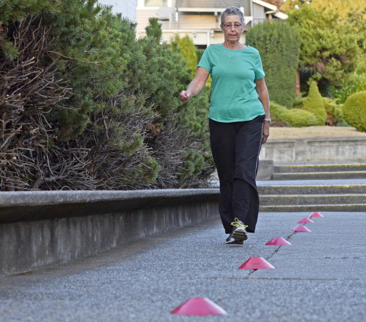 Recovering cancer patient Lynn Laurel does a six minute walk Thursday, Sept. 13, 2017, during her Skagit Valley YMCA LIVESTRONG at the YMCA class. Before her cancer, Lynn Laurel walked 4 miles every day. Now, about a year after her diagnosis, Laurel is working hard to find her way back to a healthy lifestyle. The program, LIVESTRONG at the YMCA, is offered at 211 YMCAs in 39 states and has served about 41,000 cancer patients, according to a YMCA fact sheet. The free program is targeted for people who are or have been in treatment for cancer.