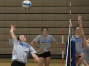 Clark College’s Dalaney Tuholski jumps for a spike during practice. The Heritage High grad is back playing volleyball after taking a year off.