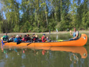 The Lower Columbia Estuary Partnership had 68 volunteers come out to Vancouver Lake on Sept. 23 for Paddle, Pick up and Picnic, where people went on canoe trips, cleaned up the beach and participated in children’s nature activities.