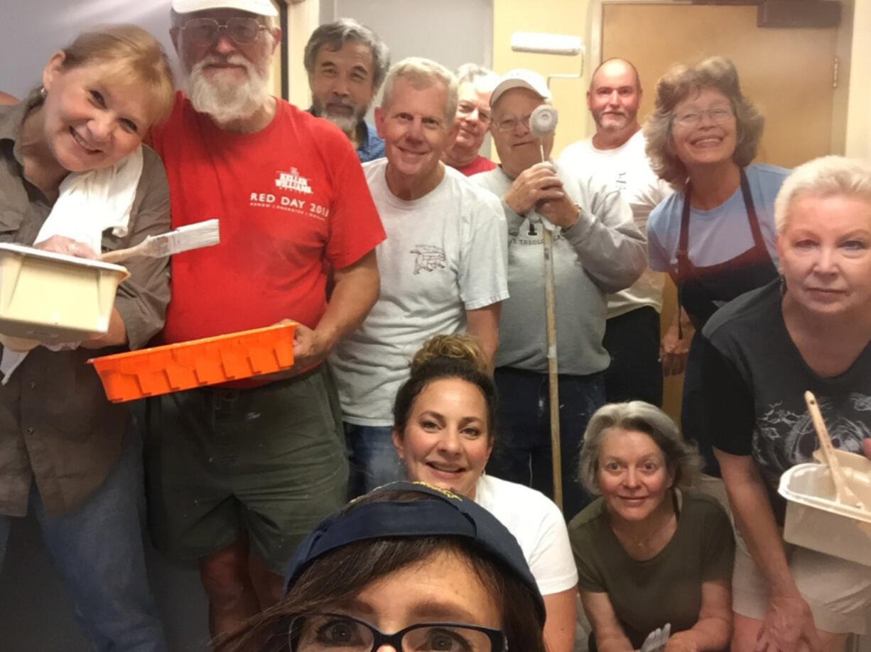 Twelve members of the Rotary Club of Vancouver painted parts of Share on Sept. 8 as part of the Rotary’s service club.