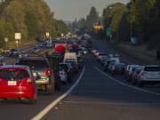 Traffic from Southeast 164th Avenue merges onto westbound state Highway 14 last Wednesday morning. Traffic congestion between 164th and the Interstate 205 can get especially bad during peak hours. Now WSDOT is looking to expand the roadway in the corridor.