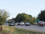 A C-Tran bus drives along the shoulder of state Highway 14 on Wednesday afternoon. An upcoming pilot project will allow buses to drive on the highway shoulder between Interstate 205 and Southeast 164th Avenue during periods of high congestion.