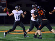 Hockinson quarterback Canon Raconelli makes a pass against Washougal at Washougal High School on Friday, October 6, 2017.