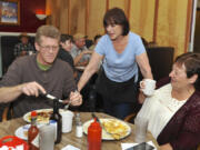 Kurt and Tina Strickland enjoy their last lunch at Jollie’s Restaurant and Lounge Sunday. The two have been coming to the Ridgefield-area favorite for 37 years.