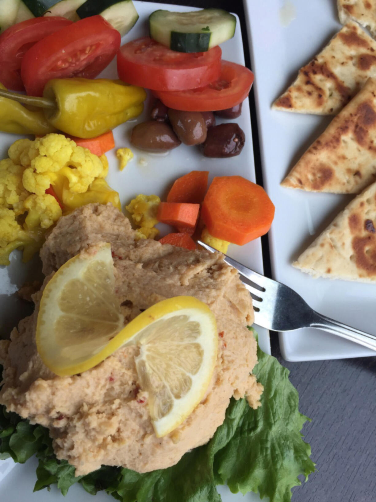 It’s hard to go wrong with the hummus plate at Benís Bottle Shop.