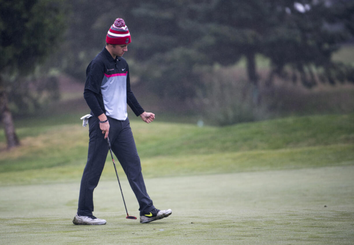 Union's Keith Lobis reacts after his putt rolled into the hole during the 4A district golf tournament at Tri-Mountain in Ridgefield Tuesday afternoon, Oct. 10, 2017.