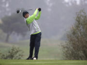 Mountain View’s Willy Yeh tees off during the 3A district golf tournament at Tri-Mountain in Ridgefield Tuesday afternoon, Oct. 10, 2017.