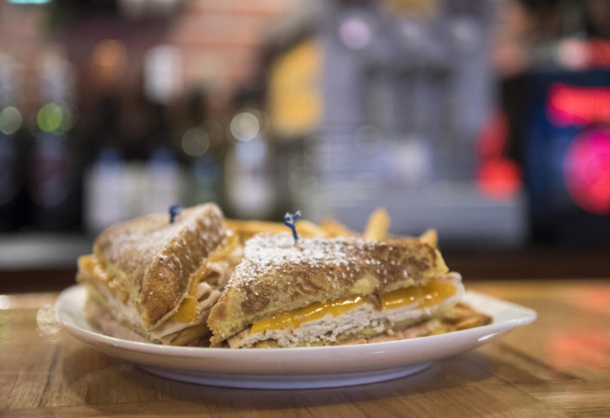 The Couve Cristo with french fries is pictured at the 99 Saloon & Grill.