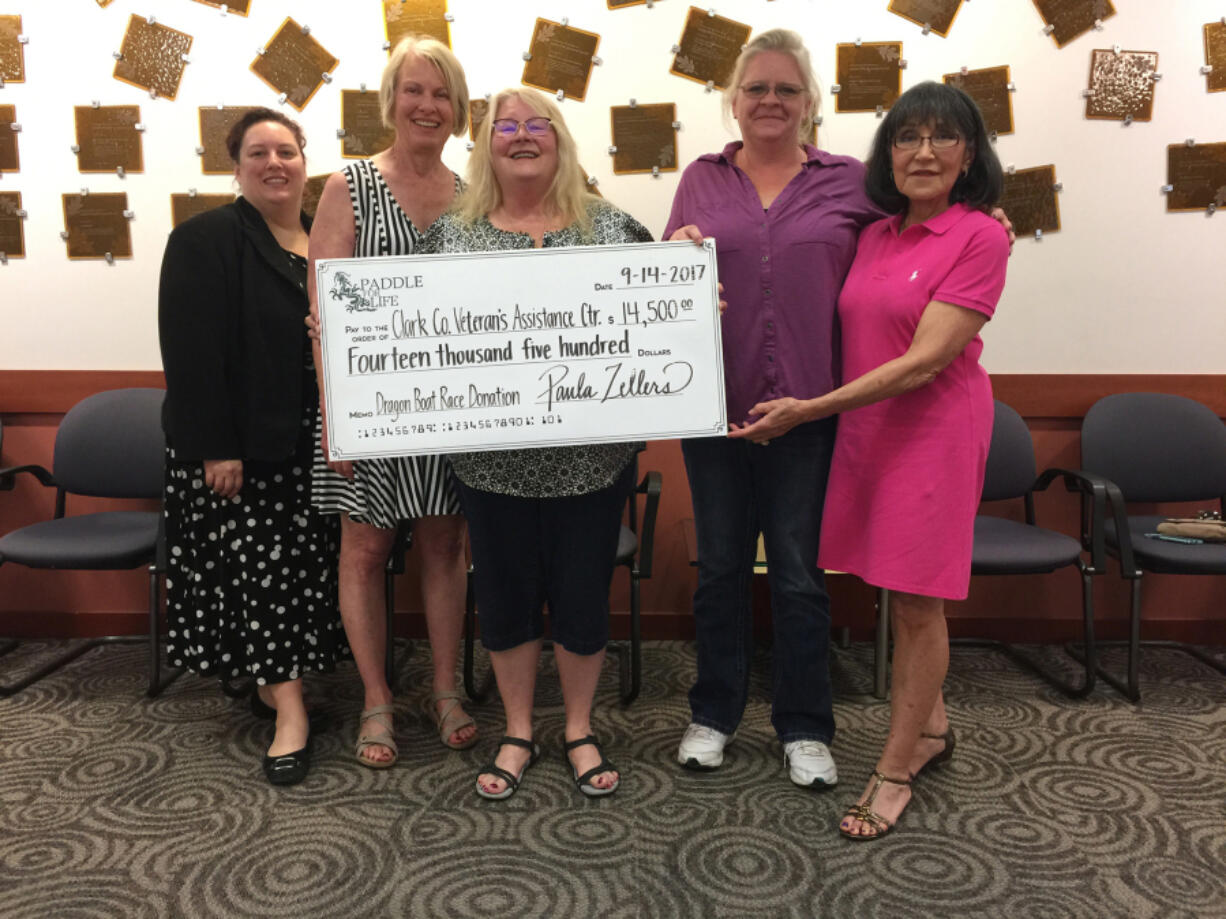 Esther Short: Even though the Paddle for Life event was canceled this year, the nonprofit organizer still raised $14,500 for the intended beneficiary: Clark County Veterans Assistance Center. From left: Rachel Beck, vice president of Paddle for Life, Gail Liberman, secretary of Paddle for Life, Judy Russel, president of Clark County Veterans Assistance Center, Sharon Tyre, chairwoman of Clark County Veterans Assistance Center, and Blanche Grimes, president of Paddle for Life.