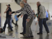 Ray Olsen, 94, of Portland was the oldest bowler competing Saturday at the 48th annual Old Timers Bowling Tournament at Allen's Crosley Lanes in Vancouver. The 40-team tournament open to bowlers 50 and older was taking place in Vancouver for the second year after starting in Portland in 1969.