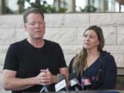 Andrew Yates, left, speaks about the condition of his daughter, Chloe Yates, 17, who was critically injured in a head-on collision on I-5 the evening of October 9, while Shannon Yates, Chloes mother, right, listens to her husbands statement during a press conference at PeaceHealth Southwest Medical Center, Friday October 20, 2017.