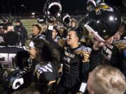 Hudson's Bay celebrates their victory after the 3A GSHL tiebreaker against Prairie at Doc Harris stadium on Monday night, Oct. 30, 2017. Hudson's Bay won the tiebreaker 6-3.