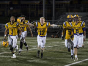 Columbia River celebrates their win after the 2A GSHL tiebreaker games at Doc Harris stadium on Monday night, Oct. 30, 2017. Columbia River won the tiebreaker against Washougal 3-0 and will be the 2-seed in the GSHL.