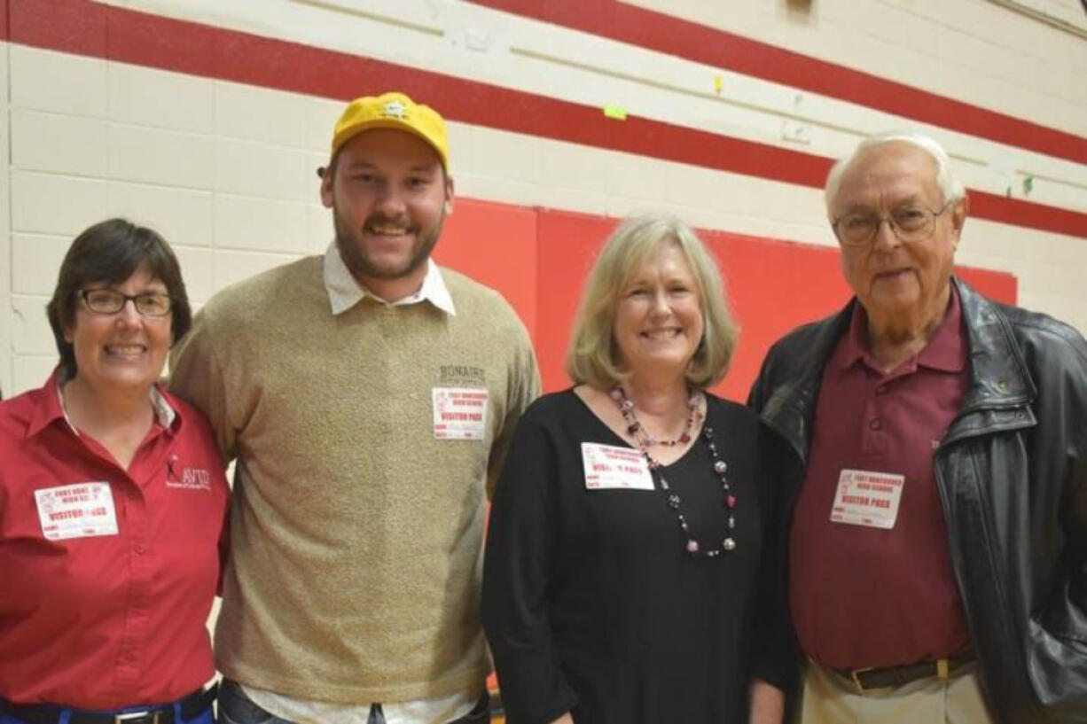 Meadow Homes: Fort Vancouver High School’s distinguished alumni, from left: Julie Merlino Pagel, class of 1979, Max Beatty, class of 2009, Linda Langsdorf Johnson, class of 1966, and Clem Eischen, class of 1945. The fifth honoree, Bruce Hagensen, class of 1962, is not pictured, as he was unable to attend the homecoming assembly.