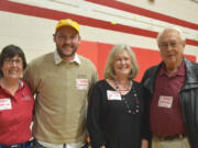 Meadow Homes: Fort Vancouver High School’s distinguished alumni, from left: Julie Merlino Pagel, class of 1979, Max Beatty, class of 2009, Linda Langsdorf Johnson, class of 1966, and Clem Eischen, class of 1945. The fifth honoree, Bruce Hagensen, class of 1962, is not pictured, as he was unable to attend the homecoming assembly.