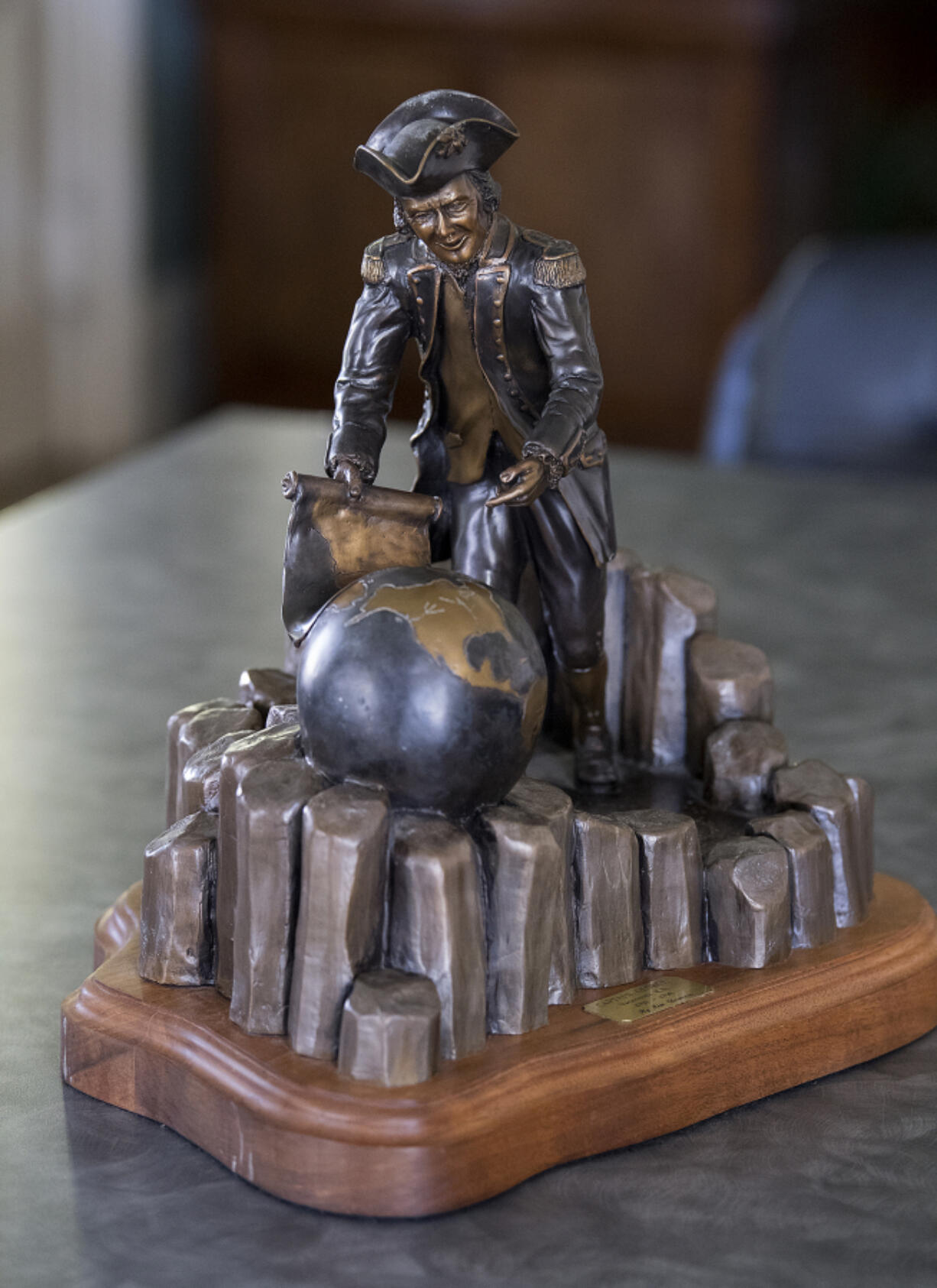 A small version of the Captain George Vancouver sculpture at Westby Associates is being auctioned off to benefit CDM Caregiving Services.