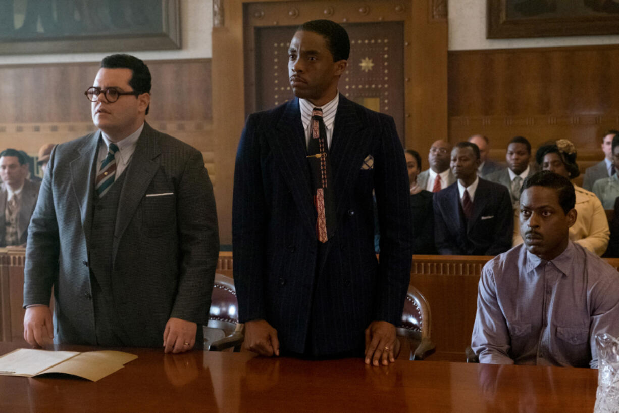 Josh Gad, from left, Chadwick Boseman and Sterling K.