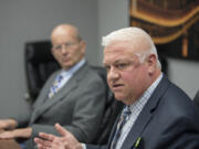 Port of Vancouver commissioner candidate Don Orange, left, listens to candidate Kris Greene at The Columbian in September.