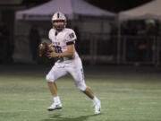 Skyview’s Max Rose (18) looks for an open receiver during the game against Battle Ground at Battle Ground District Stadium on Oct. 12, 2017.