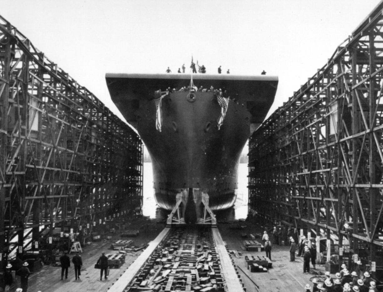 The USS Liscome Bay is launched on April 19, 1943, at the Kaiser Shipyard. It was the second escort carrier built in Vancouver.