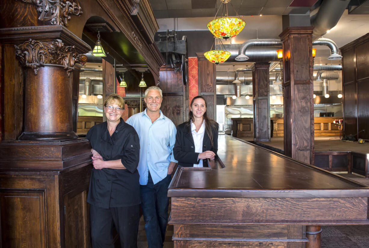 Kitchen manager Tehri Ashe, left, project manager Craig Dieffenbach and general manager Sharon Walker, right, are all pleased with the progress in remaking the restaurant at the Monticello Hotel in Longview.