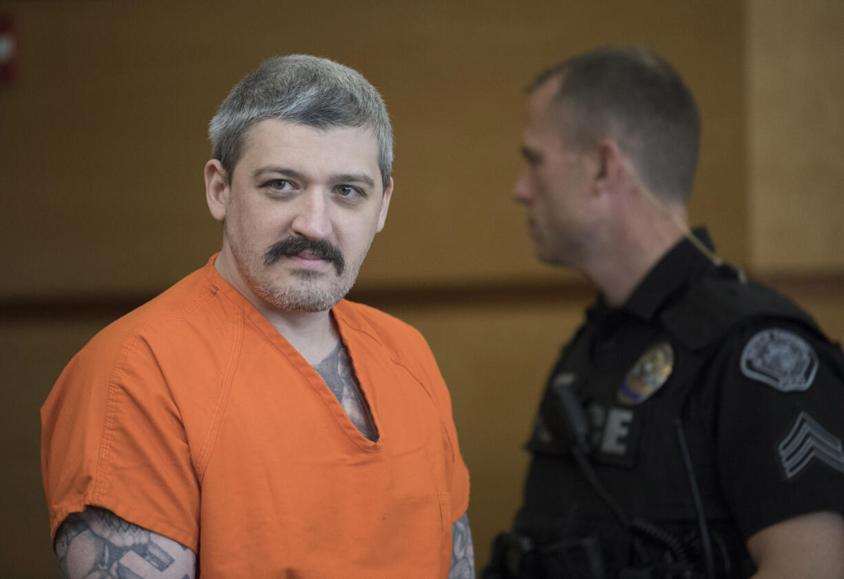 Triple-homicide suspect Brent Luyster makes his way into Clark County Superior Court for the attorneys to discuss discovery issues in his case Oct. 6, 2017. Luyster’s aggravated murder trial began Monday in Superior Court, and jury selection continues today.