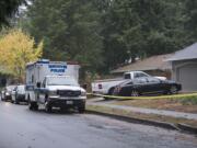 Police respond to a shooting on Northeast 49th Circle on Wednesday morning in Vancouver. Former mayoral candidate Steven Cox told police a suspected prowler entered his backyard and the two had a scuffle.