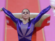 FILE - In this  July 29, 2012, file photo, U.S. gymnast McKayla Maroney poses after completing her routine on the vault during the Artistic Gymnastic women's qualifications at the 2012 Summer Olympics in London. Maroney posted a statement on Twitter Oct. 18, 2017, in which she said she was molested for years by former Team USA doctor Larry Nassar.