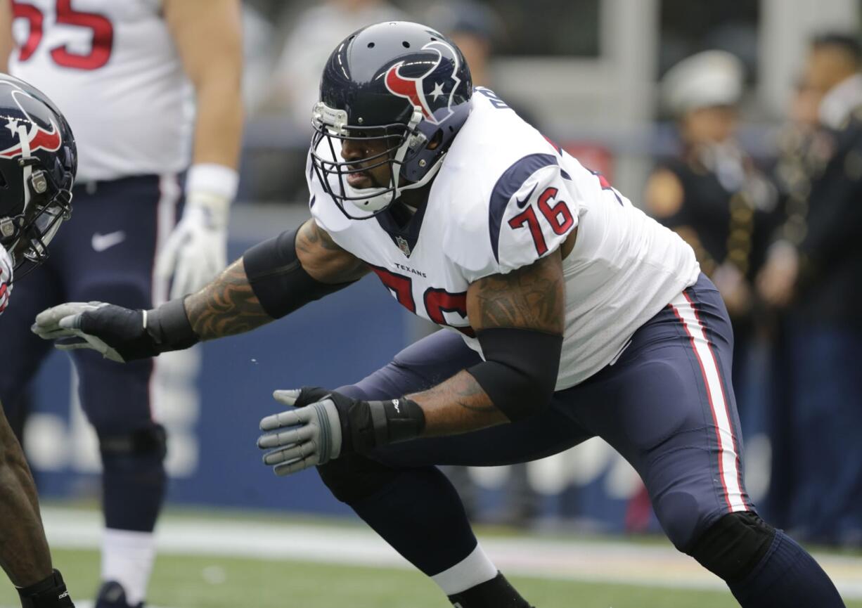 Houston Texans tackle Duane Brown on the field before an NFL football game against the Seattle Seahawks, Sunday, Oct. 29, 2017, in Seattle.