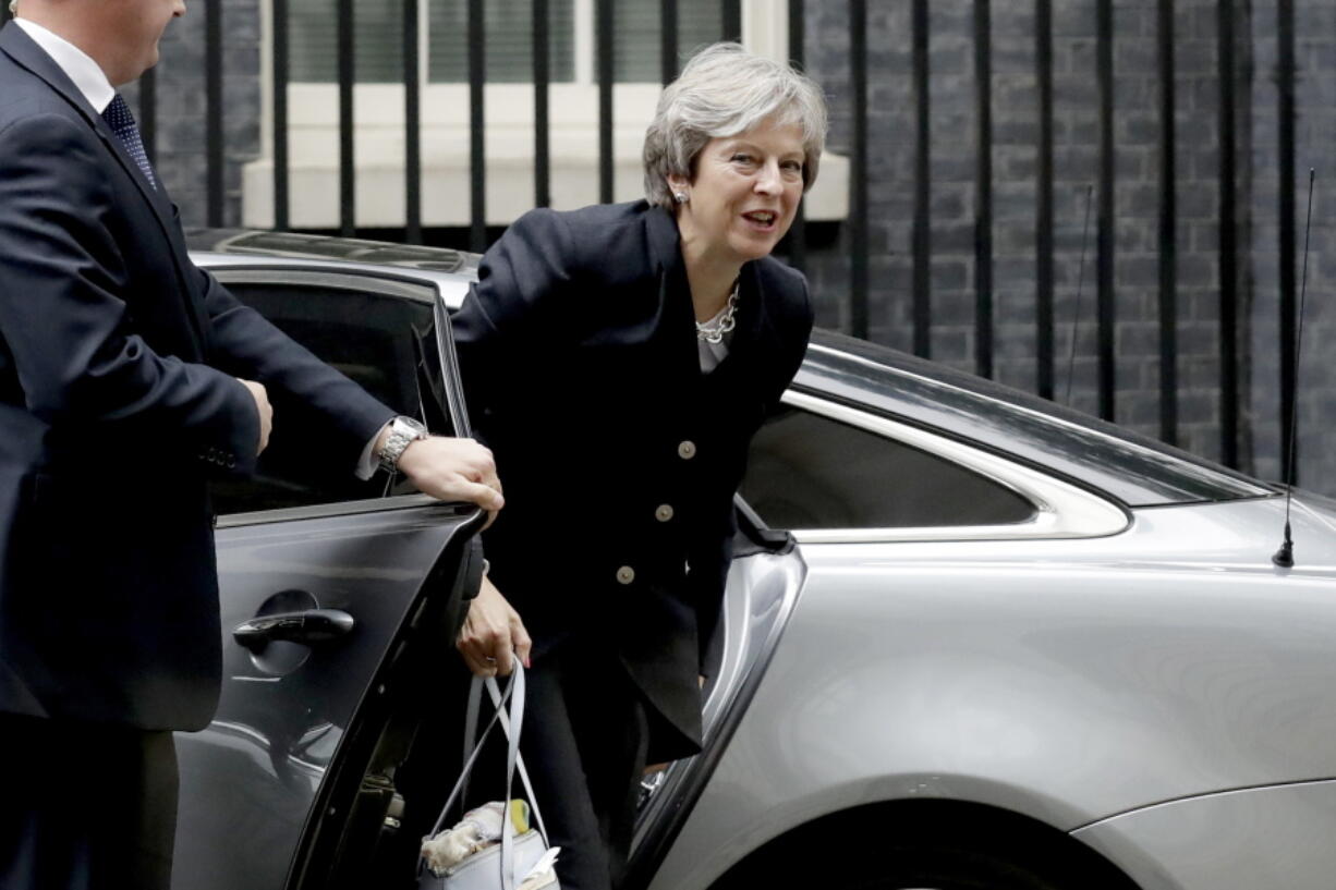 British Prime Minister Theresa May arrives at 10 Downing Street on Monday in London. May says she is “resilient” despite a difficult speech at the Conservative Party conference and growing threats to her leadership.