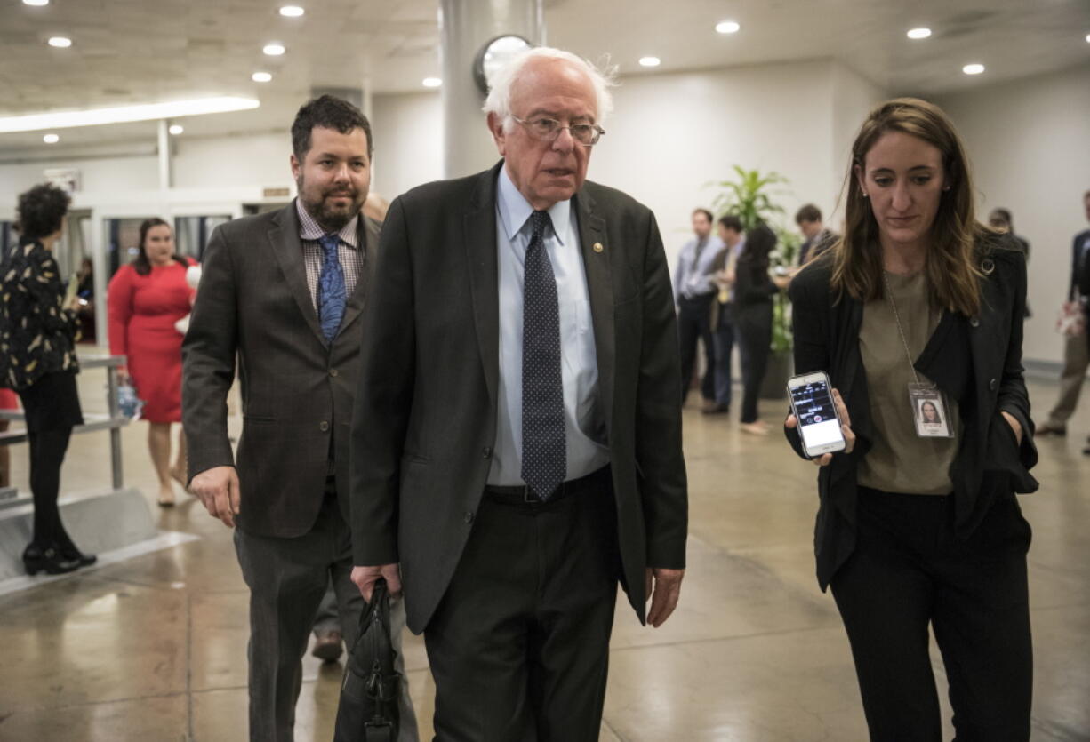 Sen. Bernie Sanders, I-Vt., the ranking member of the Senate Budget Committee, arrives for a series of votes at the Capitol in Washington on Thursday. (AP Photo/J.