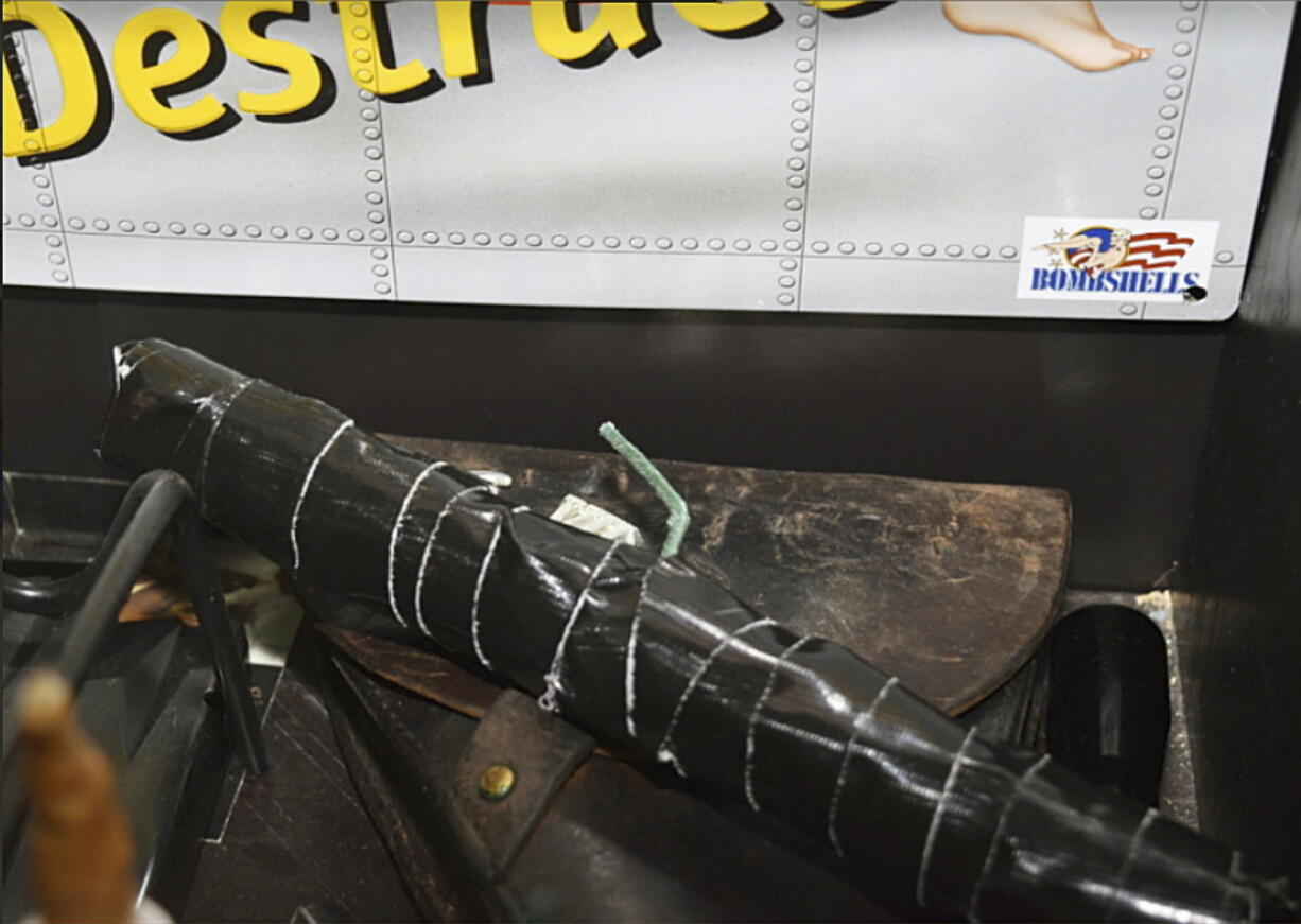 An improvised explosive device is shown in the home of Randall Drake. Sheriff’s deputies conducting a child porn raid on the home found an arsenal of guns and explosives and a homemade silencer, along with a note promising “bloody revenge.” Pinellas County Sheriff Bob Gualtieri told reporters Thursday night, Oct. 19, 2017, deputies also found aerial images of two schools and a water plant in nearby Tampa.