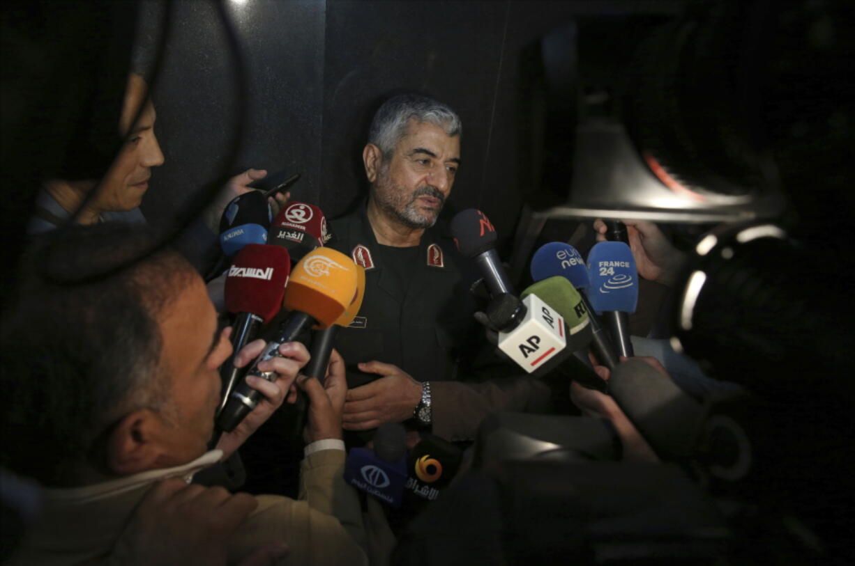 The head of Iran’s paramilitary Revolutionary Guard Gen. Mohammad Ali Jafari speaks with journalists after his speech at a conference called “A World Without Terror,” in Tehran, Iran, on Tuesday. Jafari said Tuesday that the country’s supreme leader has limited the range of ballistic missiles it makes to 2,000 kilometers, or 1,240 miles.