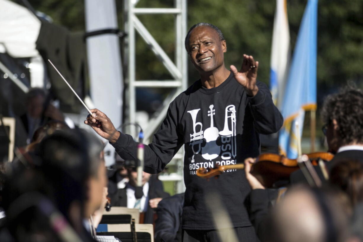 Thomas Wilkins, the Boston Symphony Orchestra’s youth and family concerts conductor, directs the symphony during a free outdoor concert.